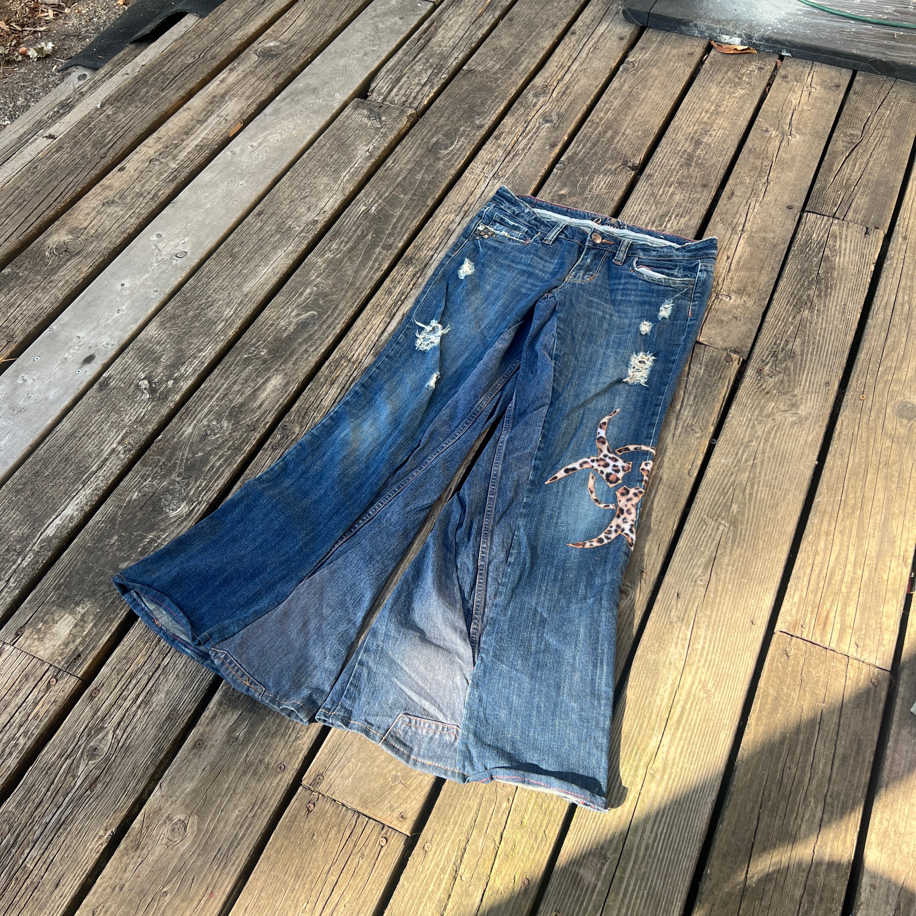 biohazard leopard/brass knuckle jeans